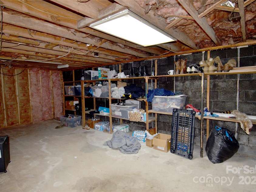 204 Quail Hollow Road, Marion, NC 28752.  MLS# CAR4244406, YatesRealty ID 13677. Basement room