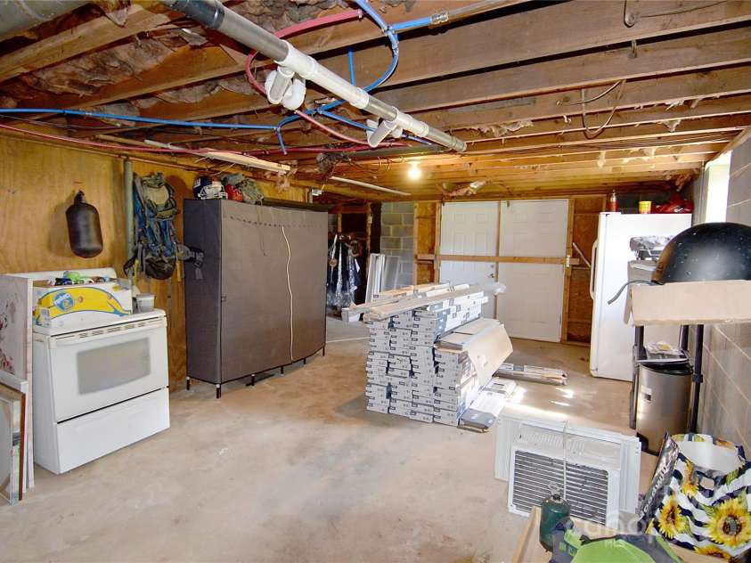 204 Quail Hollow Road, Marion, NC 28752.  MLS# CAR4244406, YatesRealty ID 13677. Basement room