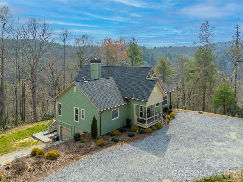 666 Never Blue Road, Flat Rock, NC 28731.  MLS# CAR4362603, YatesRealty ID 13679. 