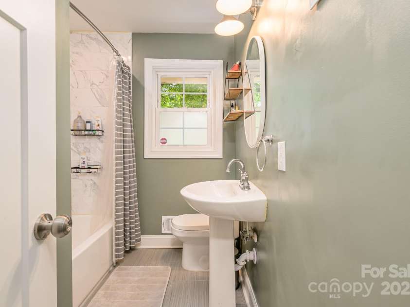 4838 Holbrook Drive, Charlotte, NC 28212.  MLS# CAR4254240, YatesRealty ID 13680. Hall Bathroom