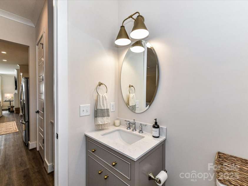 15140 Rocky Bluff Loop, Davidson, NC 28036.  MLS# CAR4228534, YatesRealty ID 13681. Half Bath with quartz vanity!