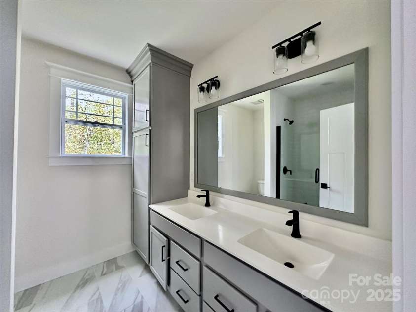 1023 Padgett Place, Black Mountain, NC 28711.  MLS# CAR4186121, YatesRealty ID 13685. Owner Bathroom