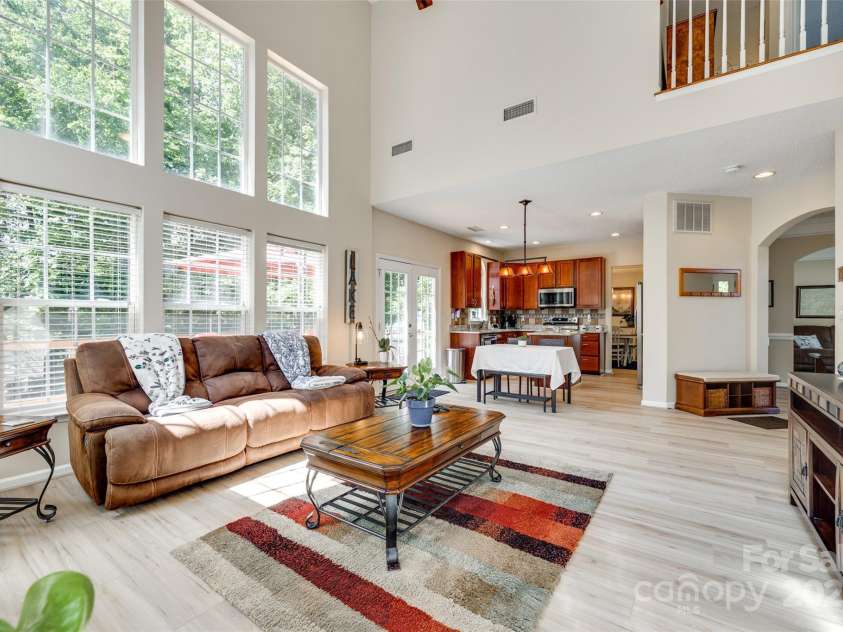 9700 Stewart Spring Lane, Charlotte, NC 28216.  MLS# CAR4252858, YatesRealty ID 13687. All new wide-plank LVP flooring on the main level!