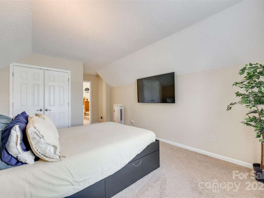 9700 Stewart Spring Lane, Charlotte, NC 28216.  MLS# CAR4252858, YatesRealty ID 13687. Bedroom #2 upstairs with large closet