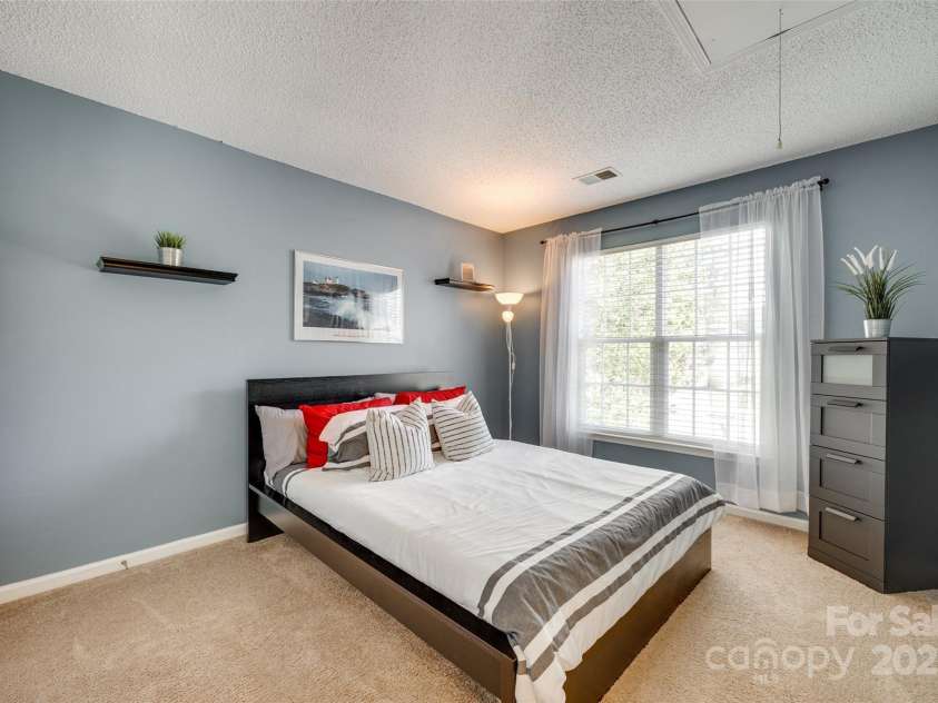 9700 Stewart Spring Lane, Charlotte, NC 28216.  MLS# CAR4252858, YatesRealty ID 13687. Bedroom #3 upstairs