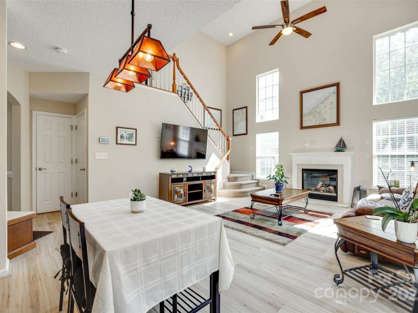 9700 Stewart Spring Lane, Charlotte, NC 28216.  MLS# CAR4252858, YatesRealty ID 13687. Breakfast area and two-story great room