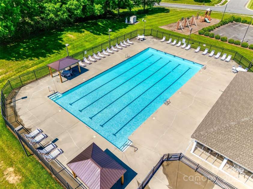 9700 Stewart Spring Lane, Charlotte, NC 28216.  MLS# CAR4252858, YatesRealty ID 13687. Community pool