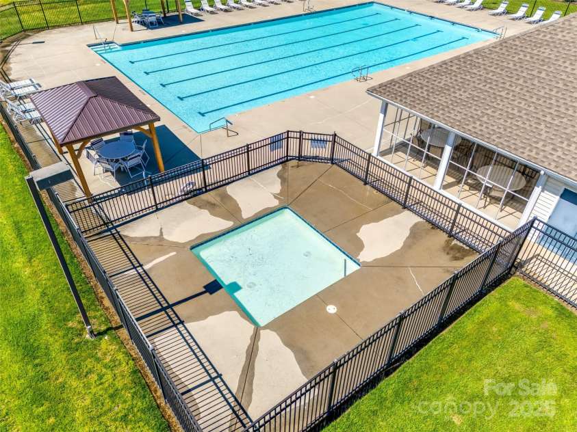 9700 Stewart Spring Lane, Charlotte, NC 28216.  MLS# CAR4252858, YatesRealty ID 13687. Community pool and kiddie pool