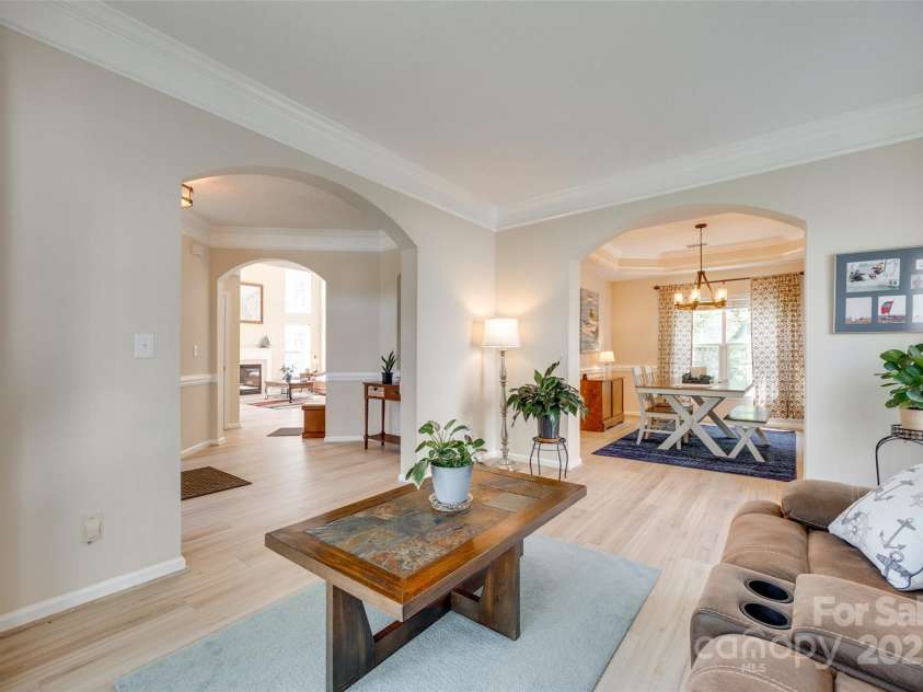 9700 Stewart Spring Lane, Charlotte, NC 28216.  MLS# CAR4252858, YatesRealty ID 13687. Formal living room open to foyer and formal dining room