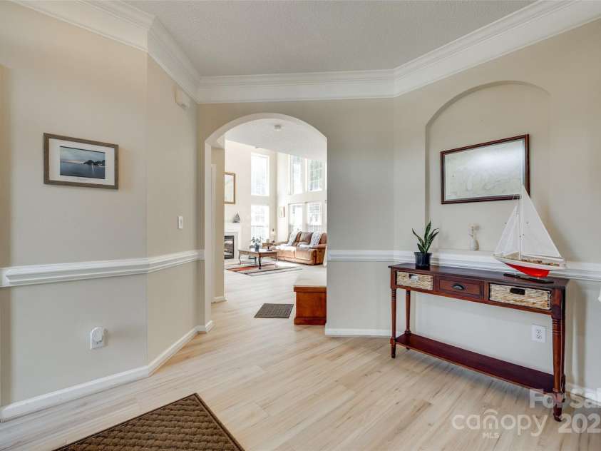 9700 Stewart Spring Lane, Charlotte, NC 28216.  MLS# CAR4252858, YatesRealty ID 13687. Foyer and entry to great room