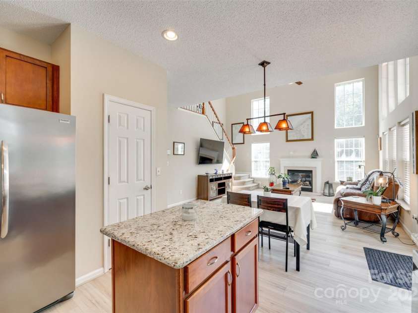 9700 Stewart Spring Lane, Charlotte, NC 28216.  MLS# CAR4252858, YatesRealty ID 13687. Kitchen open to breakfast area and great room