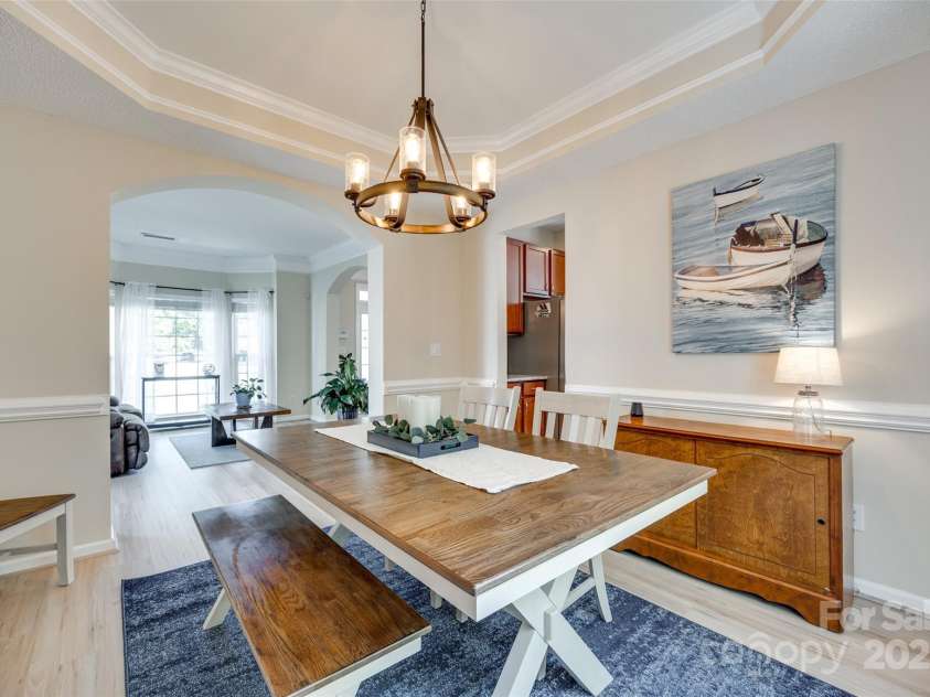 9700 Stewart Spring Lane, Charlotte, NC 28216.  MLS# CAR4252858, YatesRealty ID 13687. Spacious formal dining room with tray ceiling