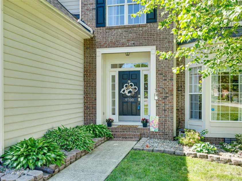 9700 Stewart Spring Lane, Charlotte, NC 28216.  MLS# CAR4252858, YatesRealty ID 13687. Welcoming front entry