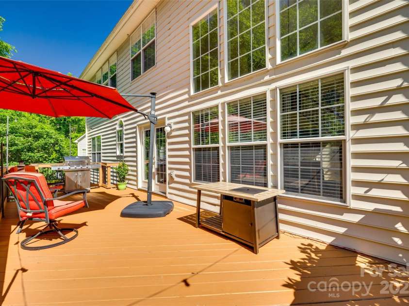 9700 Stewart Spring Lane, Charlotte, NC 28216.  MLS# CAR4252858, YatesRealty ID 13687. You will love relaxing or entertaining on this large deck!