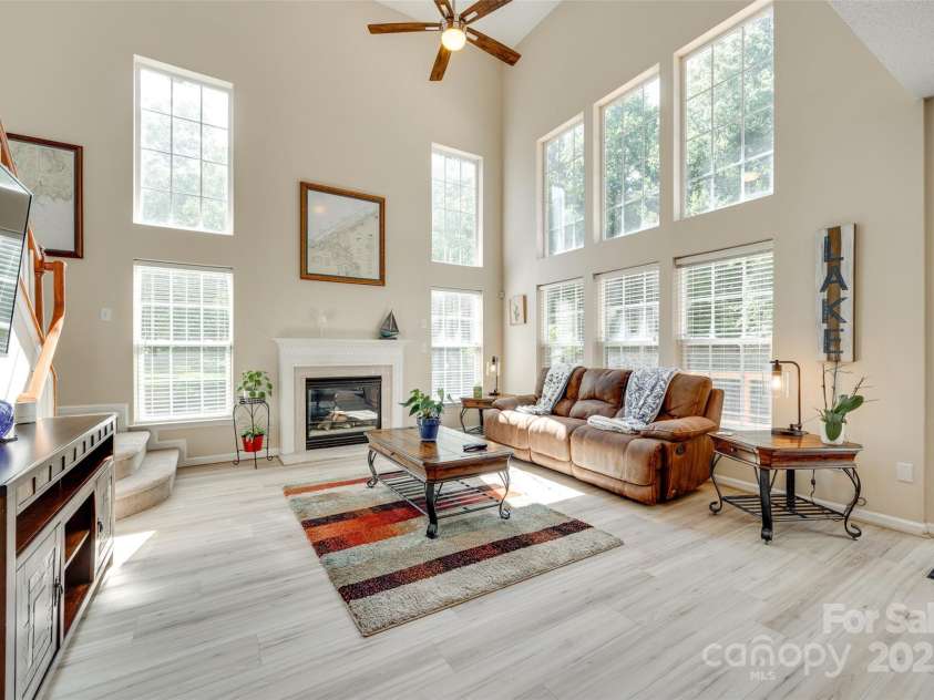 9700 Stewart Spring Lane, Charlotte, NC 28216.  MLS# CAR4252858, YatesRealty ID 13687. You will love this two-story great room with tons of natural light!