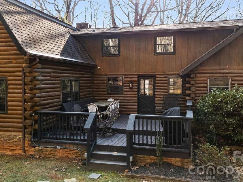 16 Decker Drive, Asheville, NC 28803.  MLS# CAR4355607, YatesRealty ID 13690. The spacious back deck is inviting with refreshed decks and railings. 