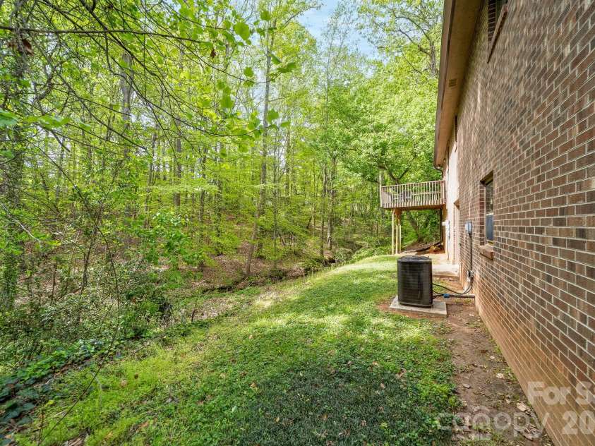 412 Poplar Street, Stanley, NC 28164.  MLS# CAR4363818, YatesRealty ID 13697. 1.23 acre backyard