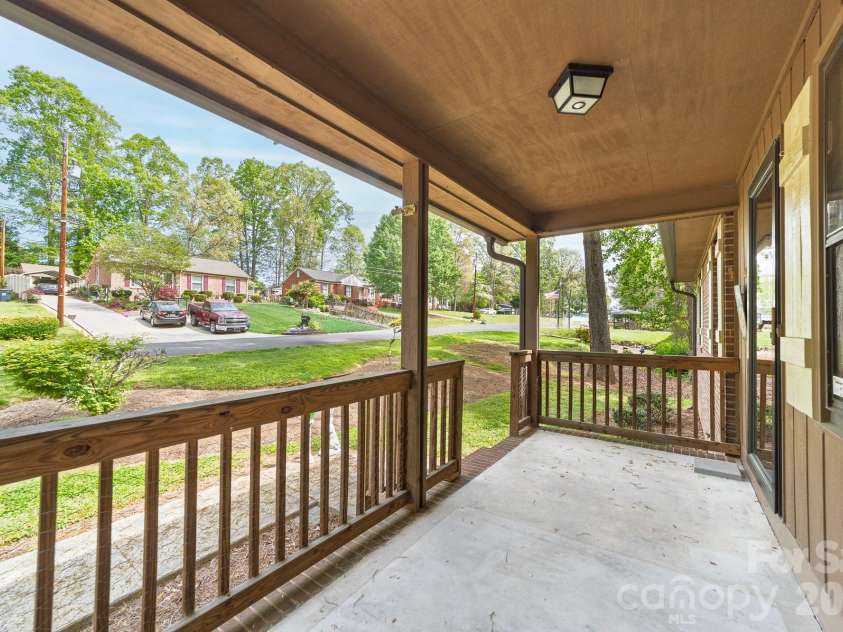 412 Poplar Street, Stanley, NC 28164.  MLS# CAR4363818, YatesRealty ID 13697. Front porch