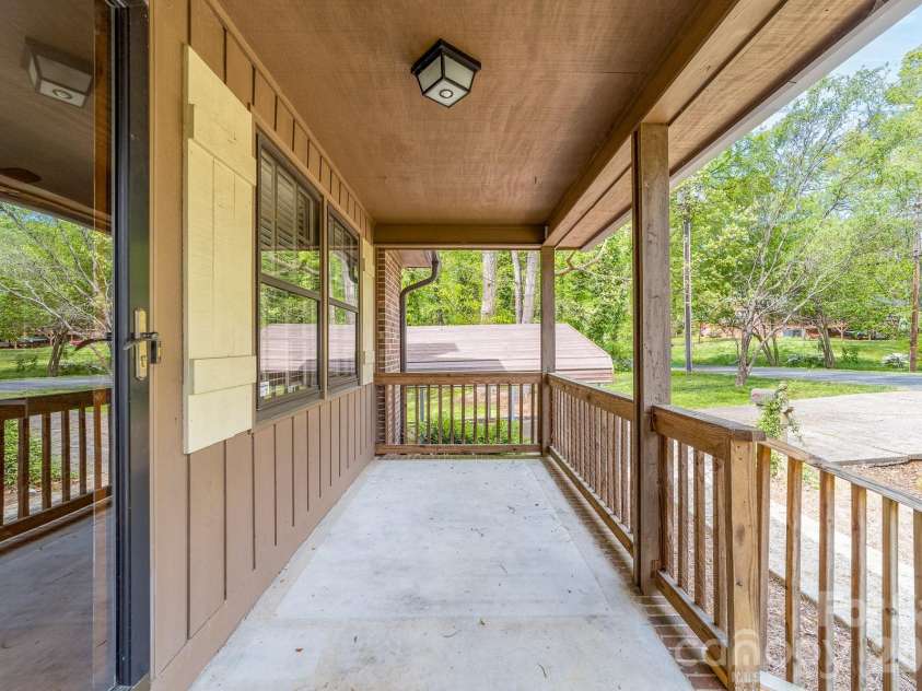 412 Poplar Street, Stanley, NC 28164.  MLS# CAR4363818, YatesRealty ID 13697. Front porch