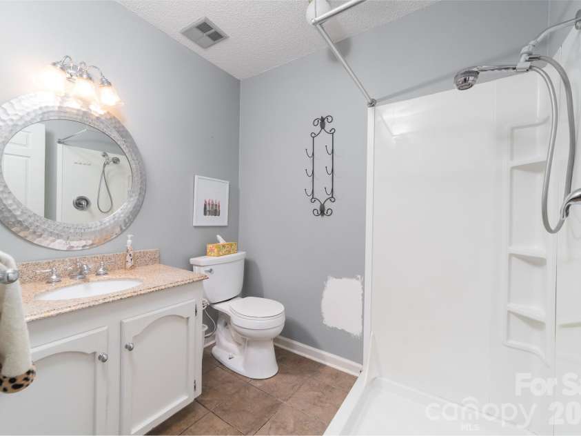 412 Poplar Street, Stanley, NC 28164.  MLS# CAR4363818, YatesRealty ID 13697. Primary bathroom