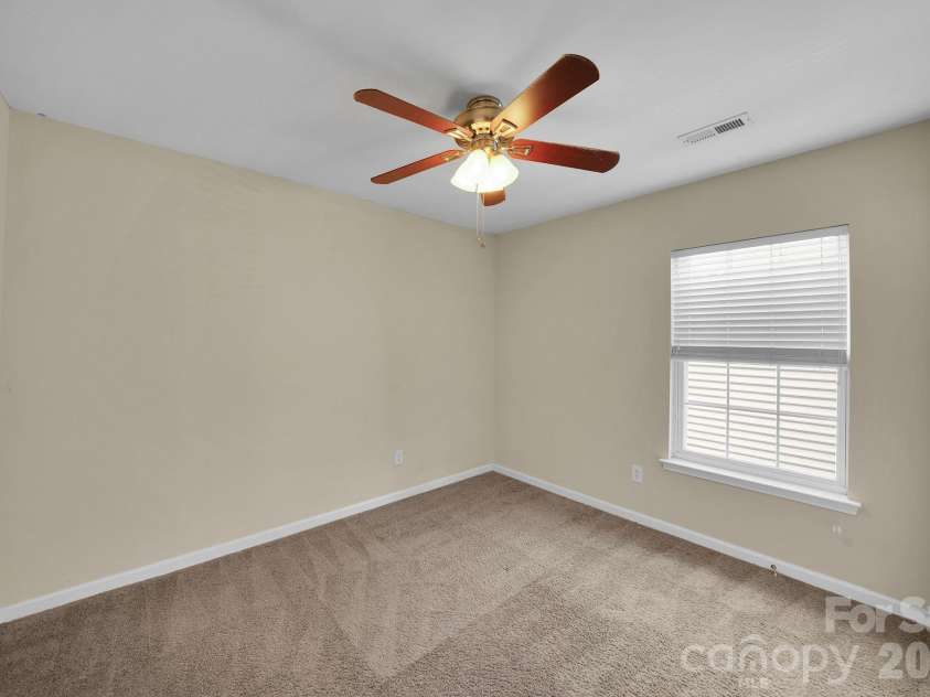 3917 Caliper Place, Fort Mill, SC 29708.  MLS# CAR4370765, YatesRealty ID 13699. Bedroom 2 from door