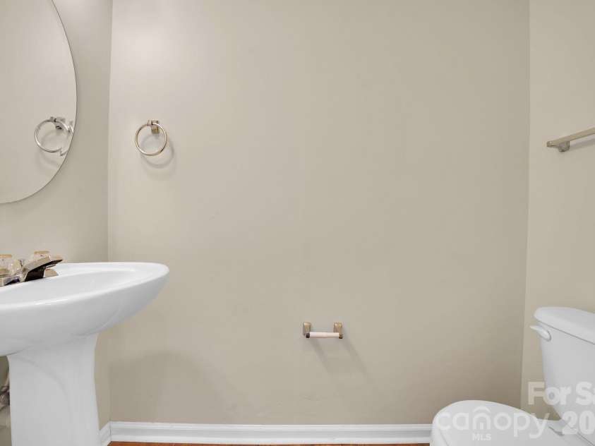 3917 Caliper Place, Fort Mill, SC 29708.  MLS# CAR4370765, YatesRealty ID 13699. Powder Room on main floor