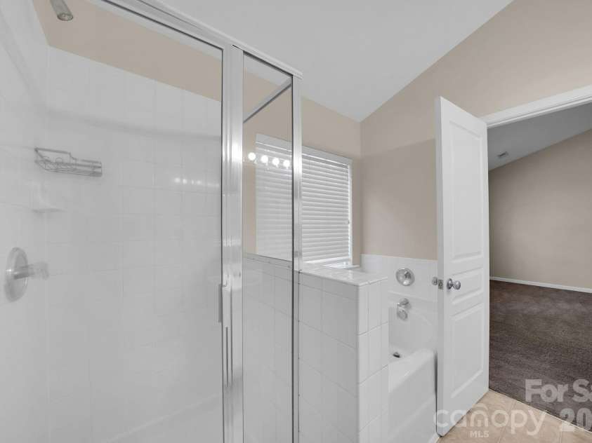 3917 Caliper Place, Fort Mill, SC 29708.  MLS# CAR4370765, YatesRealty ID 13699. Primary Bath with Soaking Tub & Shower