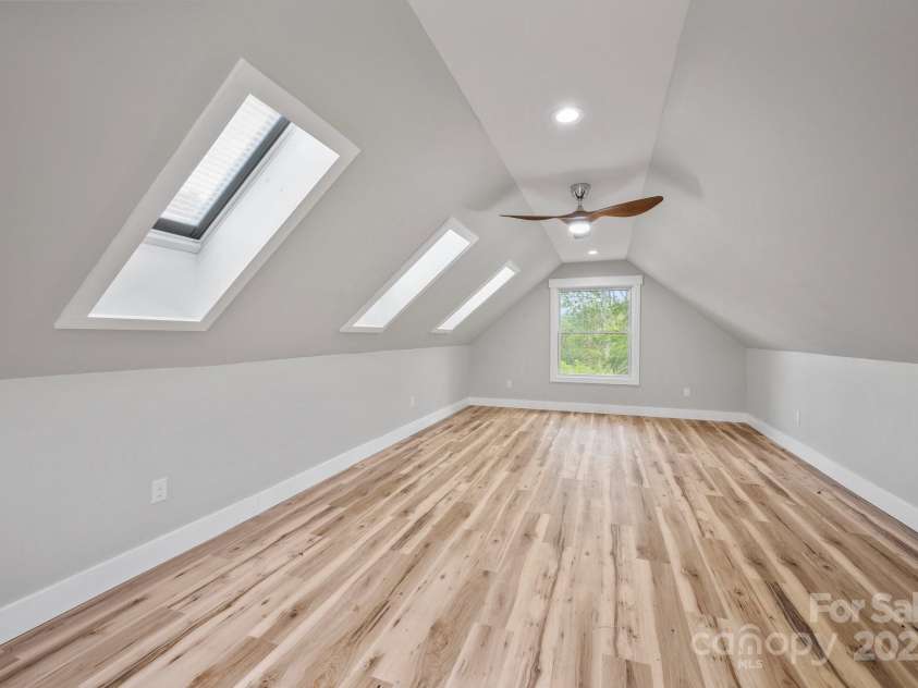 95 Beaver Drive, Asheville, NC 28804.  MLS# CAR4258303, YatesRealty ID 13700. Climate Controlled Room Over Detached Garage