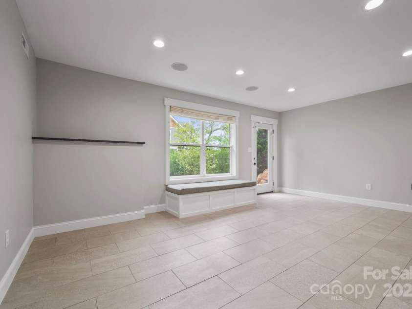 95 Beaver Drive, Asheville, NC 28804.  MLS# CAR4258303, YatesRealty ID 13700. Designated Entrance to Basement