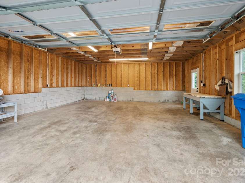 95 Beaver Drive, Asheville, NC 28804.  MLS# CAR4258303, YatesRealty ID 13700. Oversized Two-Car Garage with Room for a Shop