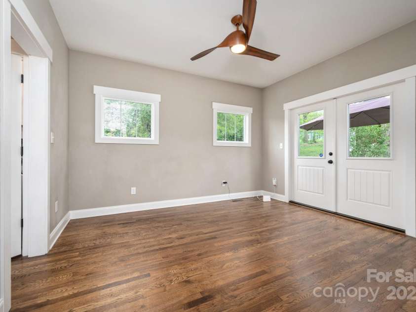 95 Beaver Drive, Asheville, NC 28804.  MLS# CAR4258303, YatesRealty ID 13700. Primary Bedroom Doors Open to Deck