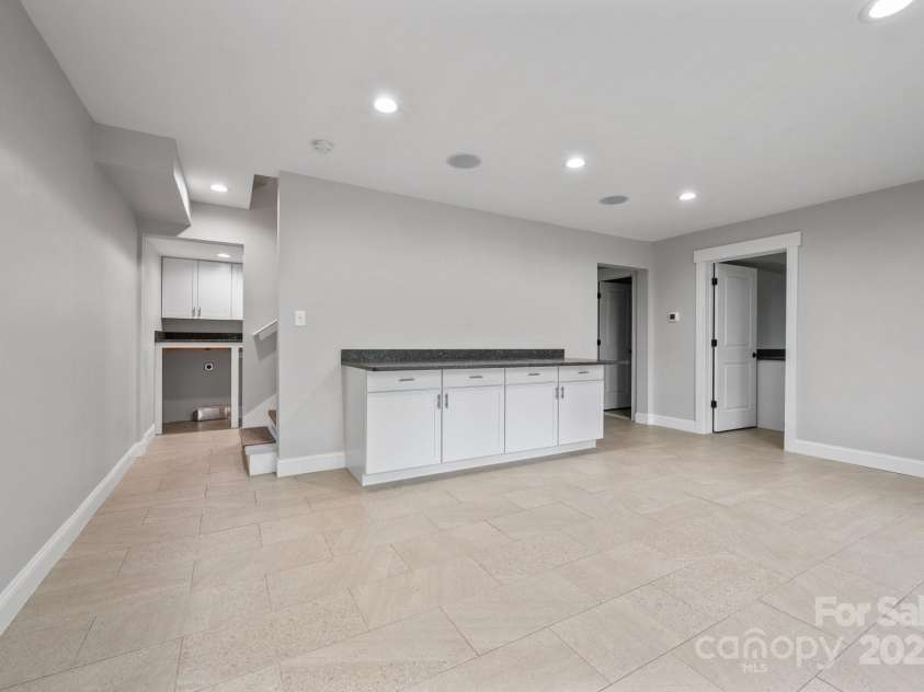 95 Beaver Drive, Asheville, NC 28804.  MLS# CAR4258303, YatesRealty ID 13700. Tile Floors, Recessed Lighting and Surround Sound in Basement