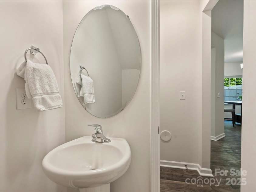 6037 Guildford Hill Lane, Charlotte, NC 28215.  MLS# CAR4252124, YatesRealty ID 13701. Main level powder room