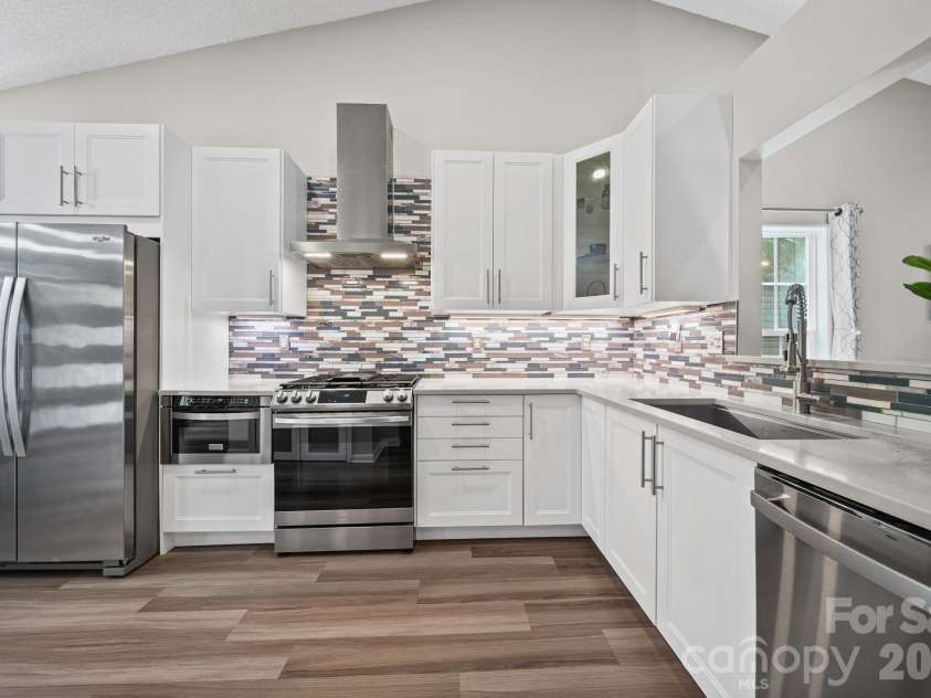 8409 Ewen Circle, Charlotte, NC 28269.  MLS# CAR4369850, YatesRealty ID 13705. 