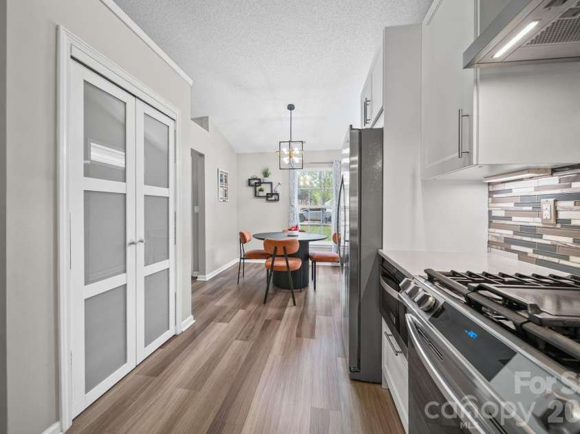 8409 Ewen Circle, Charlotte, NC 28269.  MLS# CAR4369850, YatesRealty ID 13705. 