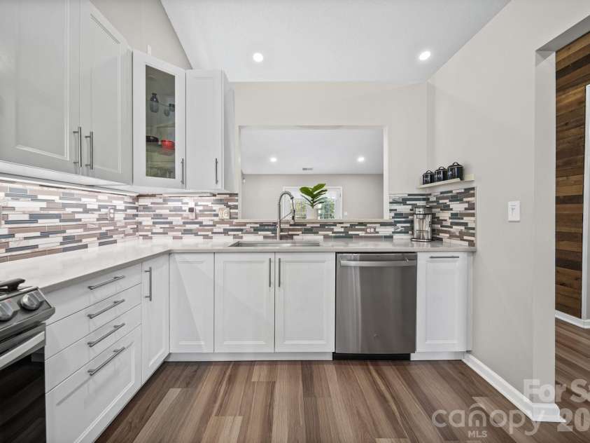 8409 Ewen Circle, Charlotte, NC 28269.  MLS# CAR4369850, YatesRealty ID 13705. 