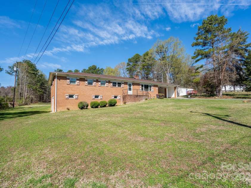 40359 Barnhardt Road, New London, NC 28127.  MLS# CAR4235032, YatesRealty ID 13706. Front view of Home