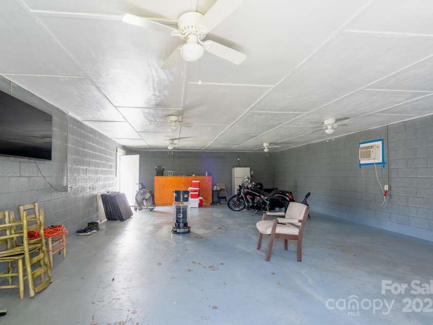 40359 Barnhardt Road, New London, NC 28127.  MLS# CAR4235032, YatesRealty ID 13706. Inside of workshop