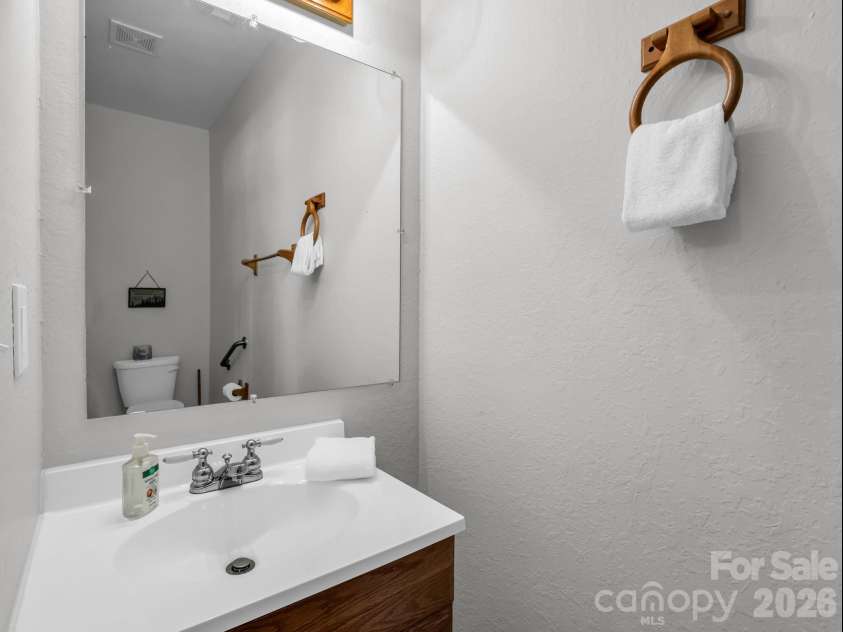 121 Fern Loop, Lake Lure, NC 28746.  MLS# CAR4357970, YatesRealty ID 13717. 1/2 Bath on Main Floor