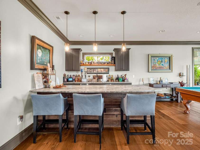 1903 Country Club Road, Hendersonville, NC 28739.  MLS# CAR4258556, YatesRealty ID 13720. Bar area in lower level living area