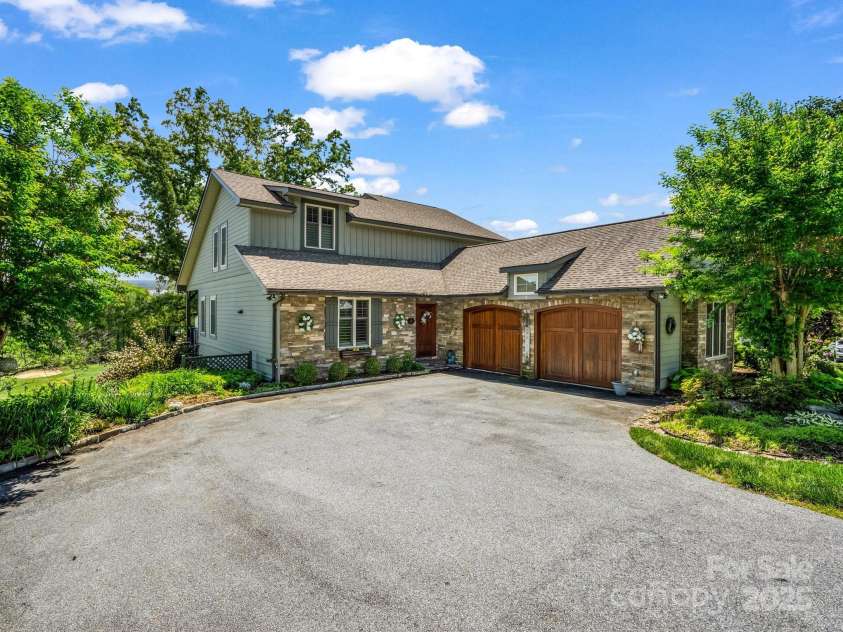 1903 Country Club Road, Hendersonville, NC 28739.  MLS# CAR4258556, YatesRealty ID 13720. Beautiful custom finishes inside and out