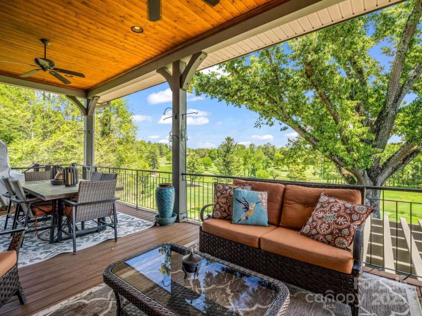 1903 Country Club Road, Hendersonville, NC 28739.  MLS# CAR4258556, YatesRealty ID 13720. Beautiful porch off of great room
