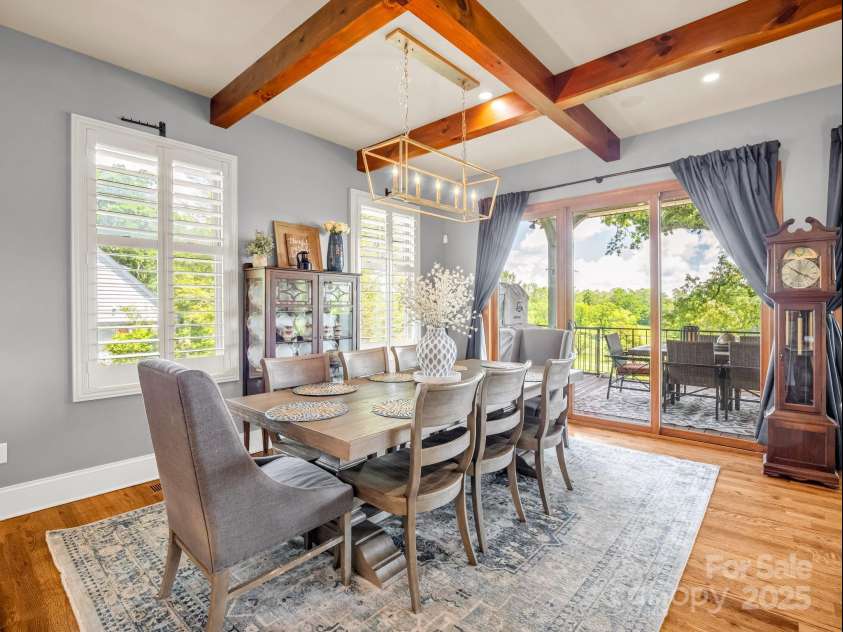 1903 Country Club Road, Hendersonville, NC 28739.  MLS# CAR4258556, YatesRealty ID 13720. Dining area opening to upper porch