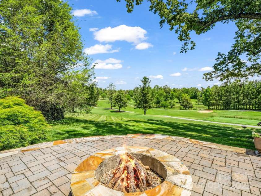 1903 Country Club Road, Hendersonville, NC 28739.  MLS# CAR4258556, YatesRealty ID 13720. Firepit area