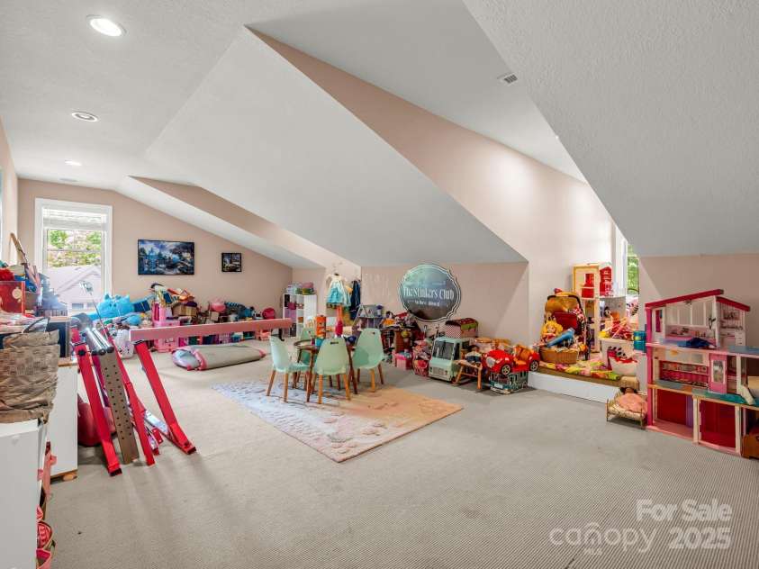 1903 Country Club Road, Hendersonville, NC 28739.  MLS# CAR4258556, YatesRealty ID 13720. Large upstairs playroom/flex space