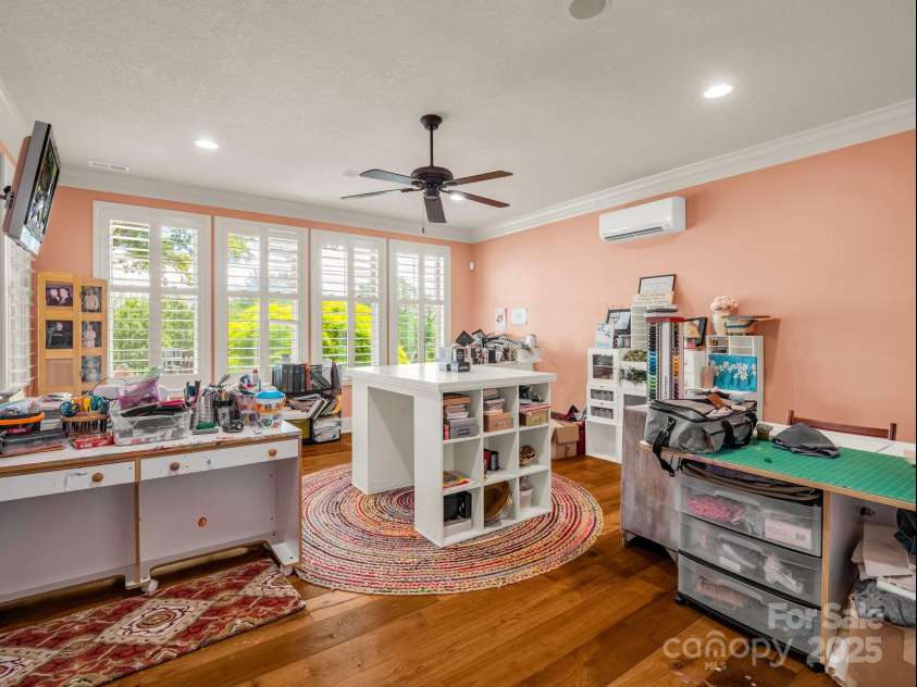 1903 Country Club Road, Hendersonville, NC 28739.  MLS# CAR4258556, YatesRealty ID 13720. Lower level flex space - Currently being used as an arts and crafts area