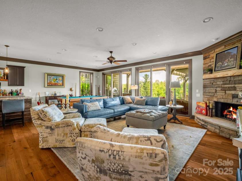 1903 Country Club Road, Hendersonville, NC 28739.  MLS# CAR4258556, YatesRealty ID 13720. Lower level living area/game room