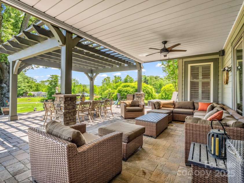 1903 Country Club Road, Hendersonville, NC 28739.  MLS# CAR4258556, YatesRealty ID 13720. Lower porch area