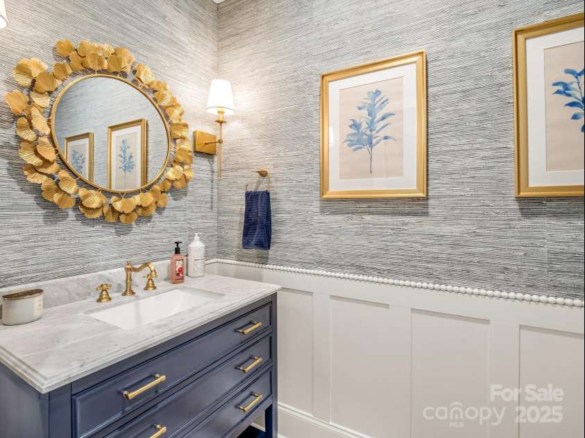 1903 Country Club Road, Hendersonville, NC 28739.  MLS# CAR4258556, YatesRealty ID 13720. Recently renovated powder room off the foyer