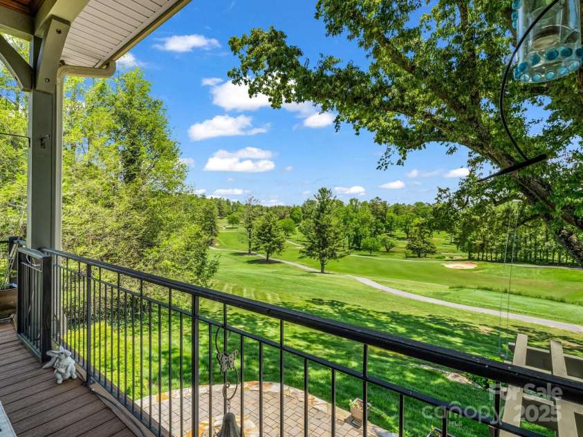 1903 Country Club Road, Hendersonville, NC 28739.  MLS# CAR4258556, YatesRealty ID 13720. View of fairway from upper porch